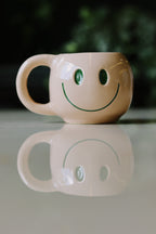 a Caneca Sorriso