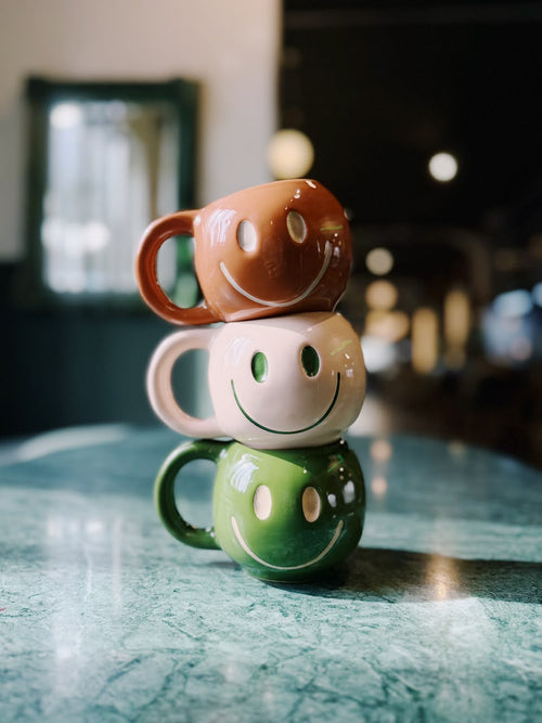 a Caneca Sorriso